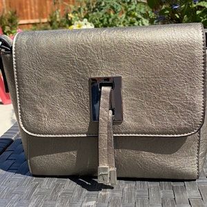 Gold toned cross body purse